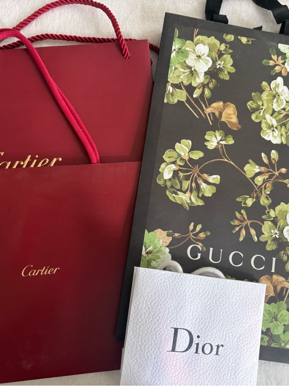 Lot of Cartier, Gucci and Dior paper gift bags
